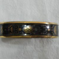 BRACCIALE RIGIDO SMALTATO NERO ORO