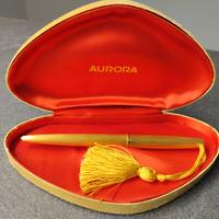 penna bagnata in oro 