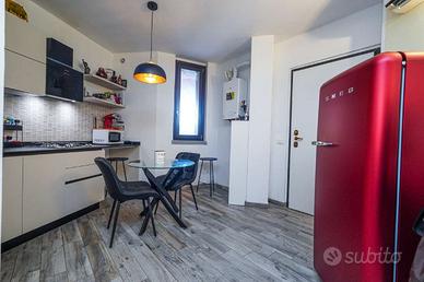 MONOLOCALE CON GIARDINO E BOX A TREZZANO ROSA