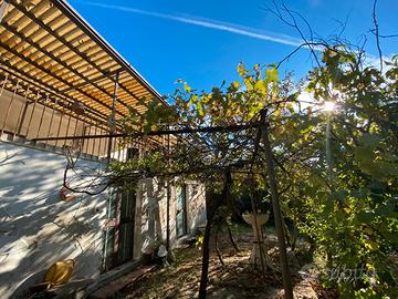 Terreno con caseggiato