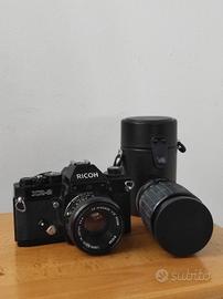 macchina fotografica e obbiettivo RICOH