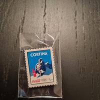 Spilla coca cola milano cortina 2026