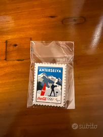 Spilla coca cola olimpiadi 2026