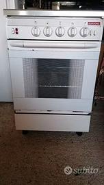 Cucina 4 fuochi a metano con forno elettrico