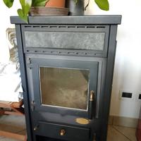 Stufa a legna + tubi + tronchetti