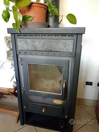 Stufa a legna + tubi + tronchetti