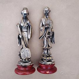 Coppia di statuette orientali vintage 