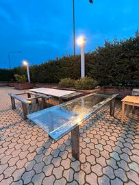 Tavoli in struttura di ferro e base vetro