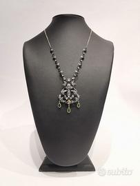 Collana in oro 18KT e argento, smeraldi e rosette