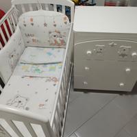 culla e bagnetto con cassetti. 