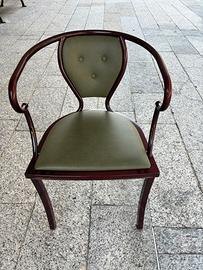 Poltroncina vintage in acciaio massiccio e pelle