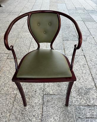 Poltroncina vintage in acciaio massiccio e pelle
