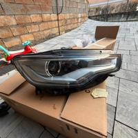 Faro anteriore dx + paraurti anteriore