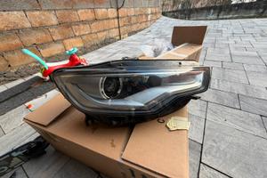 Faro anteriore dx + paraurti anteriore