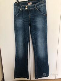 Jeans delave’ marchio Met