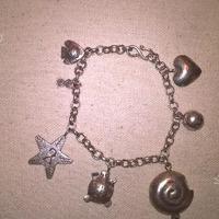 Bracciale in argento con charms