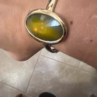 Bracciale rigido con pietra centrale