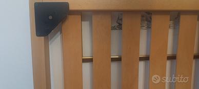 Rete matrimoniale in legno con annessi piedini