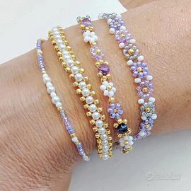 set 3 bracciali cuciti a mano con perline 