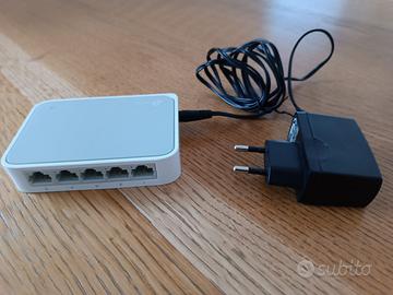 T-P LINK TL - SF1005D