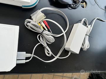 Wii completa con pedana balance board e 3 giochi