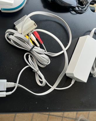 Wii completa con pedana balance board e 3 giochi