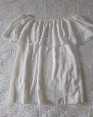 Blusa bianca con volant off-shoulder