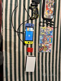 nintendo switch o led + controller + 3giochi