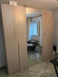 Divano, letto, comó, tavolinetto, armadio