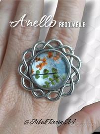 Anello regolabile con fiori veri - Artigianato
