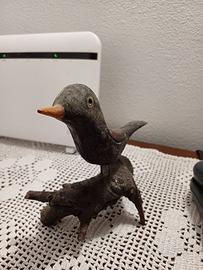 Soprammobile merlo nero intagliato 