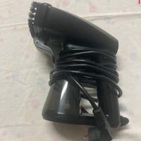 Fero da stiro a vapore per tende abbigliamento