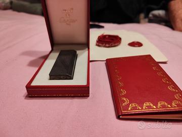 Accendino Must di Cartier 