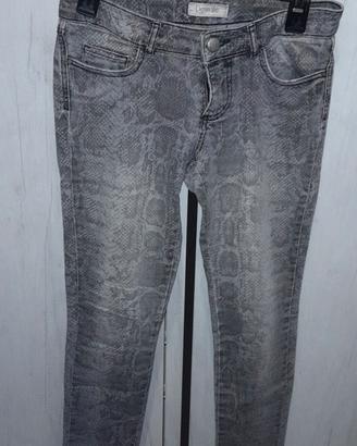 Jeans grigio motivo pitonato