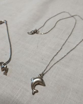 Collana e braccialetto in argento con delfini.