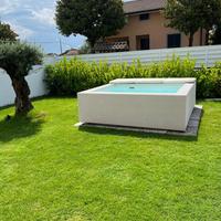 Piscina fuori terra elegante, riscaldatore e bolle