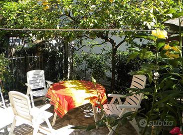 Appartamento con giardino garage wifi aria condizi