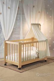 Lettino con sbarre in legno 