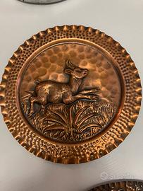 Piatti in rame sbalzato decorazioni da appendere