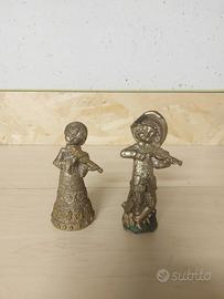 Coppia Statuette Vintage in Peltro Cesellato a Man