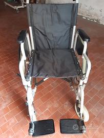 SEDIA A ROTELLE