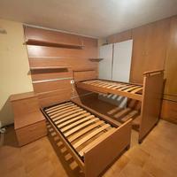 Letti a castello scorrevoli, scrivania a scomparsa