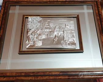 Quadro laminato in argento cornice in radica noce