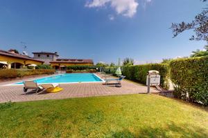 BILOCALE CON GIARDINO E BOX DOPPIO IN RESIDENCE CO