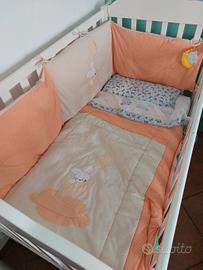 Paracolpi e piumino lettino