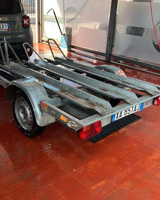 carrello portamoto stema
