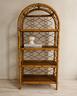 libreria-ad-arco-in-rattan-anni-70-modernariato