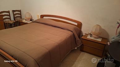 camera da letto matrimoniale in legno