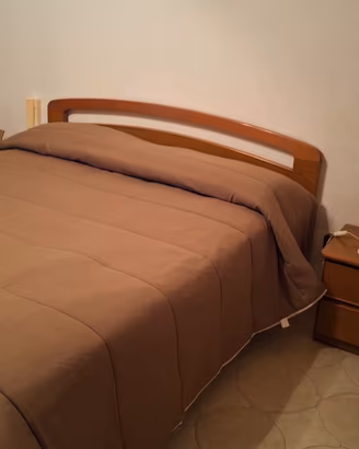 camera da letto matrimoniale in legno
