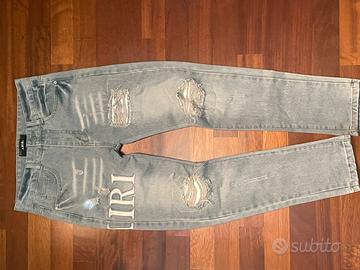 Jeans strappati azzurri S uomo (46)